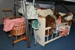 A BOX AND LOOSE TOYS, DOLLS, PRAMS, COT, ETC, including a wicker doll's pram, assorted plastic dolls