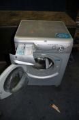 A HOTPOINT WF326 WASHING MACHINE in silver width 60cm depth 60cm height 87cm (PAT pass, powers up,