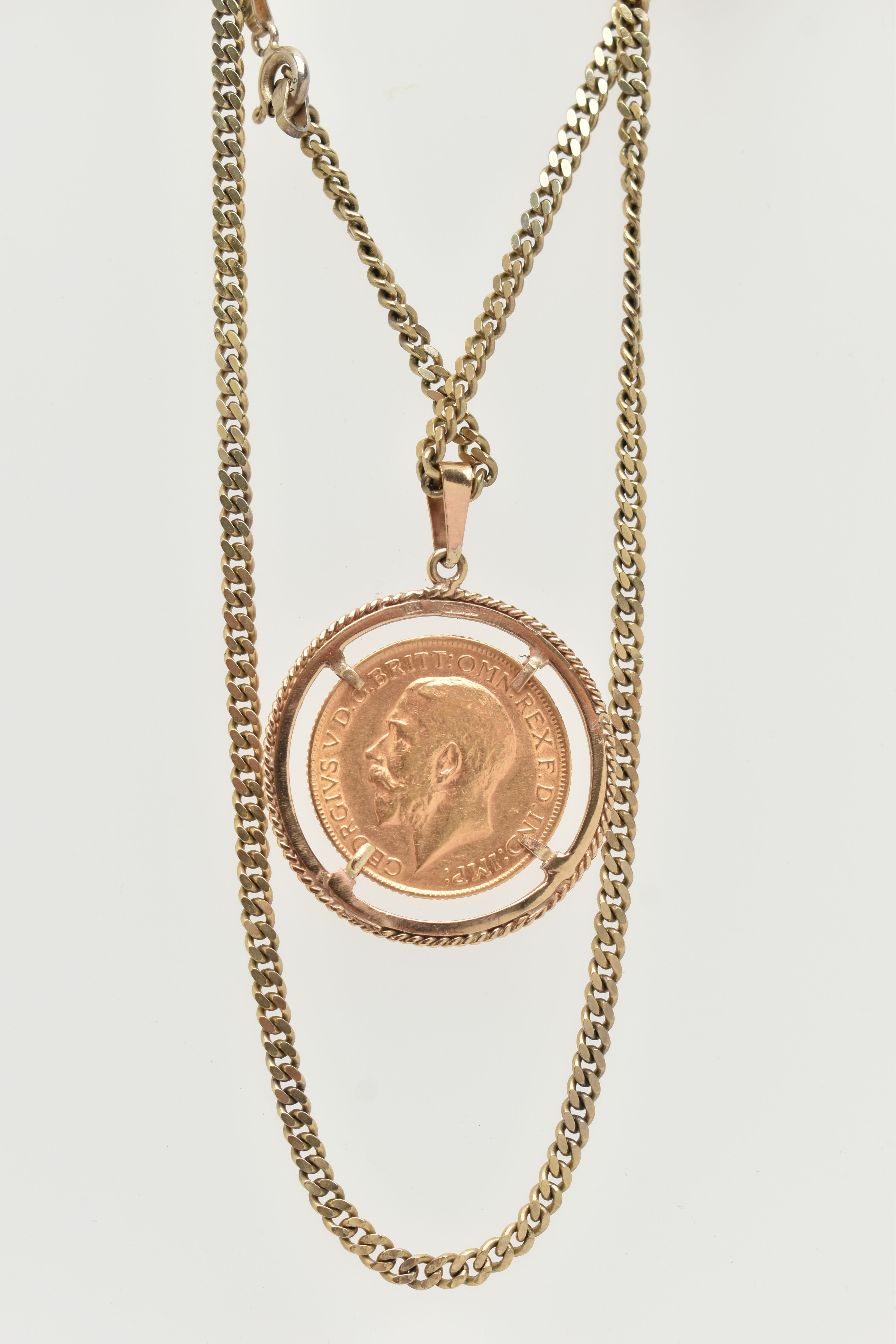 A SOVEREIGN PENDANT AND CHAIN, designed as a George V 1914 full sovereign within a circular 9ct - Image 3 of 4