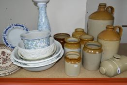 A GROUP OF STONEWARE FLAGONS AND CERAMICS, comprising two large flagons, five jars, one foot warmer,