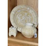 THREE PIECES OF CREAM ZSOLNAY 'OLD IVORY' WARES, comprising a charger with relief figural