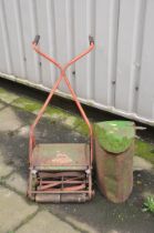 A VINTAGE QUALCAST MANUAL CYLINDER MOWER with grass box Condition Report: some surface rust and