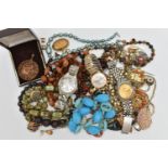 A BAG OF ASORTED COSTUME JEWLLERY, to include a selection of beaded necklaces, an oriental dragon