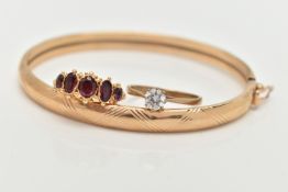 THREE ITEMS OF JEWELLERY, to include a 9ct bangle, a 9ct paste ring, both with 9ct hallmarks,