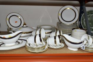 A ROYAL DOULTON 'HARLOW' PATTERN DINNER SET, comprising two gravy jugs, one stand, an oval meat
