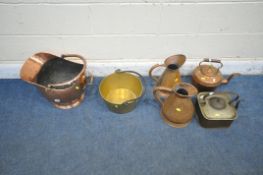 A SELECTION OF METALWARE, to include a copper coal scuttle, two copper jugs, a copper kettle,