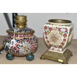 A FISCHER BUDAPEST OIL LAMP BASE AND URN, comprising a floral design lamp base on a pink ground,
