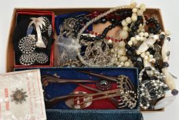 A BOX OF ASSORTED ITEMS, to include a white metal Bohemian garnet oval cluster, missing fittings