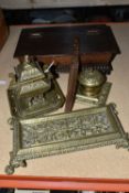 A GROUP OF DESK ITEMS, comprising two brass inkwells, one of Oriental style, having a finial in