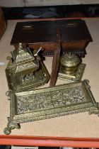 A GROUP OF DESK ITEMS, comprising two brass inkwells, one of Oriental style, having a finial in