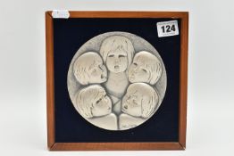 A 'OTTA VIANI' FRAMED WHITE METAL PICTURE, a circular form disk depicting five children, signed '