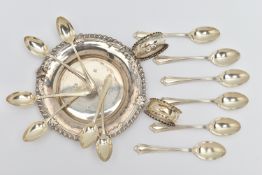 A SELECTION OF SILVER ITEMS, to include a round tray, with shell detail and gadrooned rim,