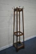 A 20TH CENTURY OAK HALL COAT AND HAT STAND, with eight hooks, 44cm squared x 184cm (condition