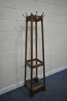 A 20TH CENTURY OAK HALL COAT AND HAT STAND, with eight hooks, 44cm squared x 184cm (condition