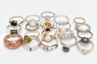 ASSORTED WHITE METAL RINGS, nineteen in total, various designs, some set with semi-precious stones