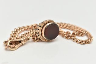 AN EARLY 20TH CENTURY 9CT YELLOW GOLD ALBERT CHAIN AND HARD STONE SWIVEL FOB, the graduating solid