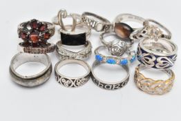 ASSORTED WHITE METAL RINGS, fifteen in total, various designs, some set with semi-precious stones