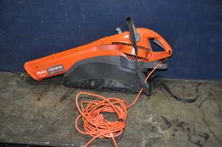 A FLYMO GARDEN VAC 2200 TURBO with collection bag (PAT pass and working)