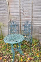 A GREEN PAINTED CAST ALUMINIUM GARDEN TABLE, and similar chairs, labelled Nova (3)
