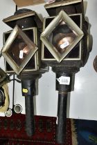 A PAIR OF LATE 19TH / EARLY 20TH CENTURY COACHING LAMPS, black lacquered finish, bear regd no.