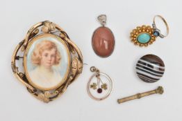 A SMALL ASSORTMENT OF ITEMS, to include a yellow metal open work lavalier pendant, set with garnet