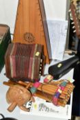 A GROUP OF MUSICAL INSTRUMENTS, comprising an 'Aiden Edwards' Celtic Psaltery harp and bow, paper