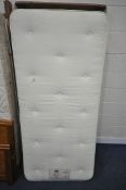 A PINE SINGLE GUEST BED, with a cumfilux mattress and somerset mattress (condition report: general