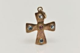 A YELLOW METAL CROSS PENDANT, polished cross set with a central garnet cabochon and four blue