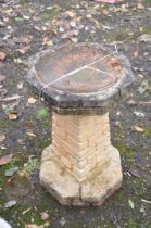 A WEATHERED COMPOSITE BRICK EFFECT BIRD BATH, 39cm diameter x height 61cm