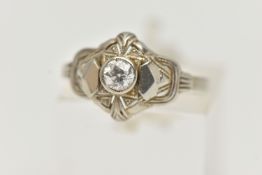 A SINGLE STONE DIAMOND RING, designed as a central old cut diamond within a pierced geometric
