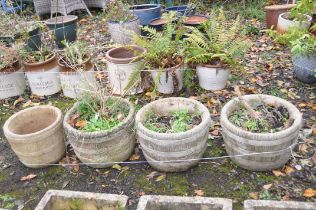 THREE WEATHERED COMPOSITE COOPERED EFFECT CIRCULAR PLANTERS, signed Sanford stone, diameter 44cm x