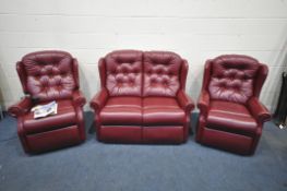 A CELEBRITY THREE PIECE BURGUNDY LOUNGE SUITE, comprising a two seater sofa, length 130cm x depth