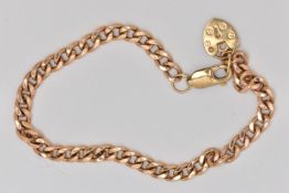 A 9CT GOLD CHAIN BRACELET, the curb link bracelet with spring release clasp, suspending a heart