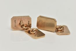 A PAIR OF 9CT GOLD CUFFLINKS, rectangular engine turned pattern to one side the other with