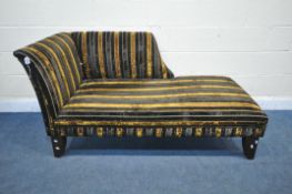 A MODERN BLACK AND GOLD STRIPPED CHAISE LOUNGE, length 155cm x depth 78cm x height 82cm (condition
