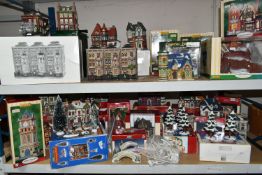 A COLLECTION OF BOXED CERAMIC CHRISTMAS VILLAGE BUILDINGS, by Department 56, Lemax and Copperfield