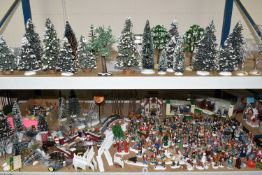A COLLECTION OF CHRISTMAS VILLAGE FIGURES, TREES AND OTHER ITEMS, to include over one hundred