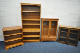 A MID CENTURY TEAK PARKER KNOLL BOOKCASE, with two drawers, width 88cm x depth 27cm x height
