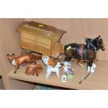 A GROUP OF BESWICK POTTERY FIGURES, comprising a Beswick Shire Horse with harness and wooden gypsy