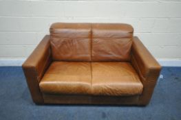 A TANNED LEATHER TWO SEATER SOFA, with 140cm x depth 84cm x height 78cm (condition report: general