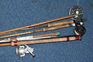 A GROUP OF FOUR VINTAGE FISHING RODS, to include a Shakespeare 'Flymaster', etc. (4) (Condition