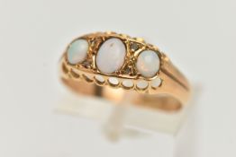 AN EARLY 20TH CENTURY OPAL AND DIAMOND RING, set with three oval opal cabochons, interspaced with