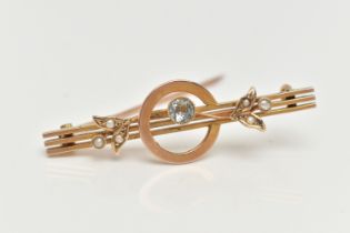 AN EARLY 20TH CENTURY GEM SET BROOCH WITH CASE, the brooch centring on a circular cut aquamarine