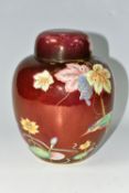 A CARLTON WARE GINGER JAR AND COVER WITH THE KINGFISHER PATTERN ON A ROUGE GROUND, the base