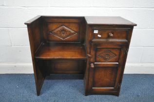 A 20TH CENTURY SOLID OAK HALL BENCH, with a single drawer and cupboard door, width 89cm x depth 42cm