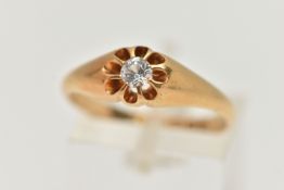 AN EARLY 20TH CENTURY, 18CT GOLD RING, centring on a circular cut colourless stone, assessed as