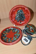 THREE PIECES OF ANITA HARRIS POTTERY, comprising a pair of hand painted pin dishes with Christmas