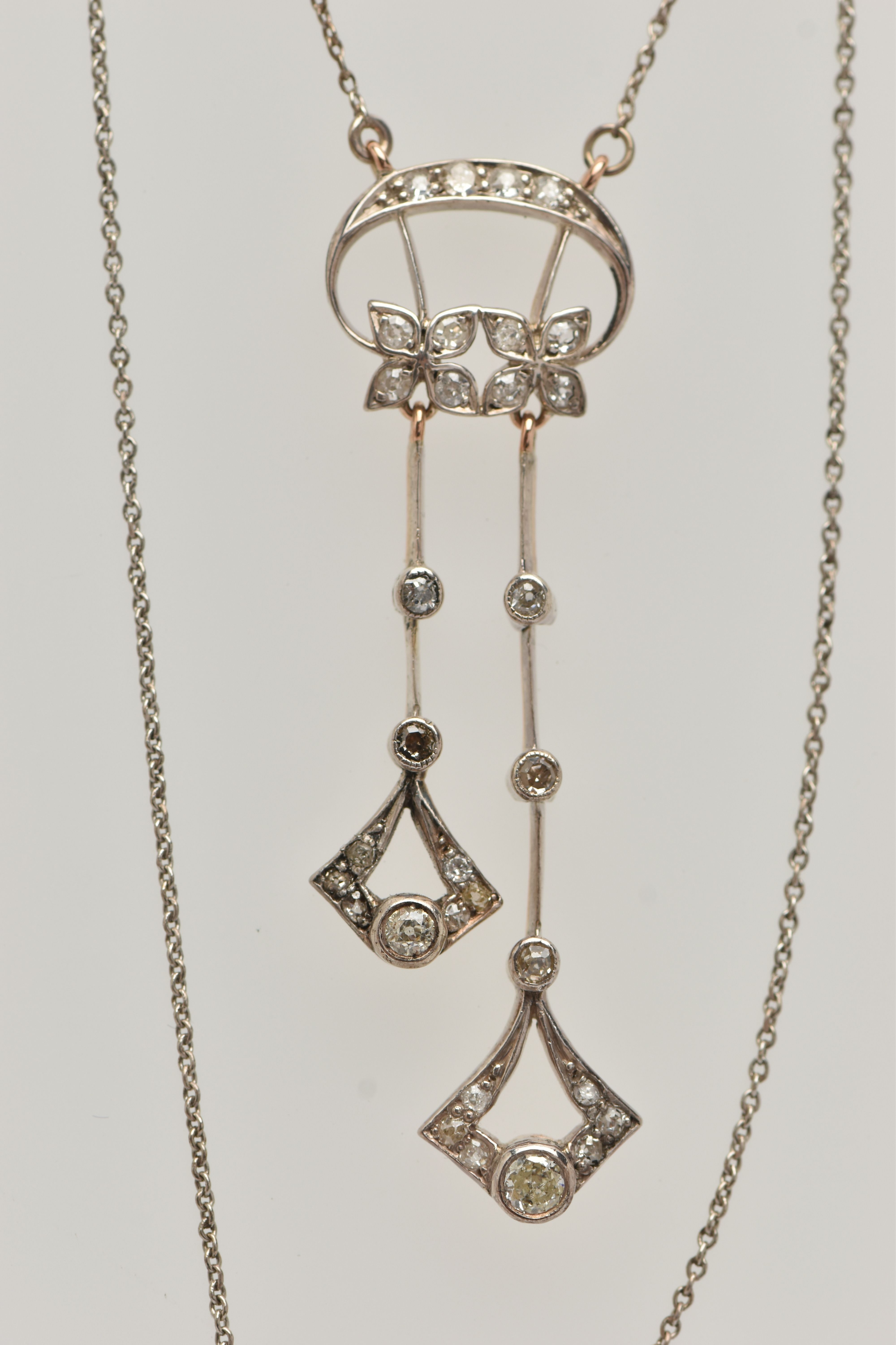 AN EARLY 20TH CENTURY DIAMOND NECKLACE, designed as two flower heads beneath a crescent line, - Image 4 of 4