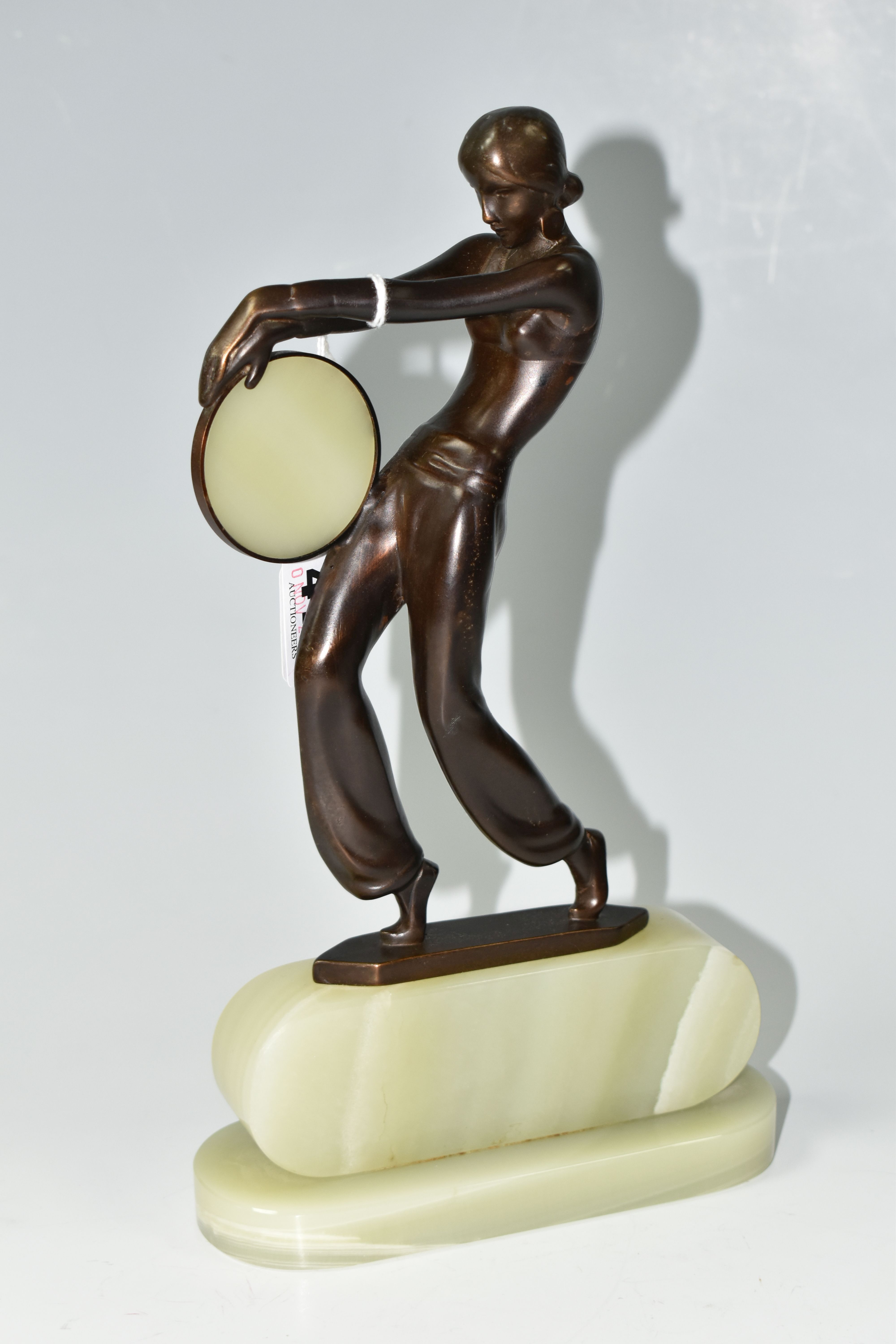 AFTER LORENZL, an Art Deco style bronze figure of a tambourine dancer, on a green onyx base, - Image 3 of 7