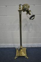 A WARING AND GILLOWS BRASS CORINTHIAN STANDARD LAMP, converted from a paraffin lamp, with foliate